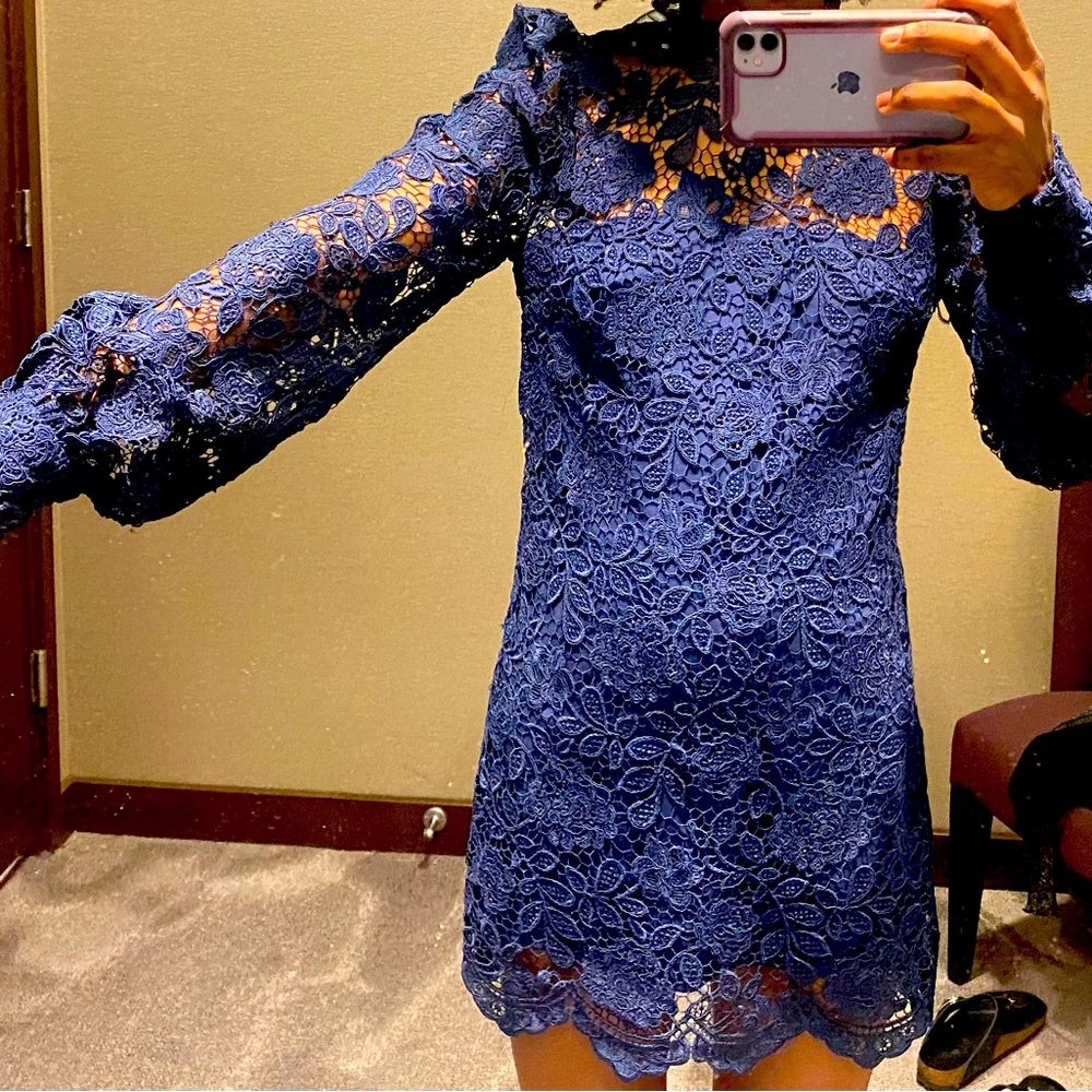 This dress is in the color (Midnight), size 2. Brand name is ZACPOSEN.